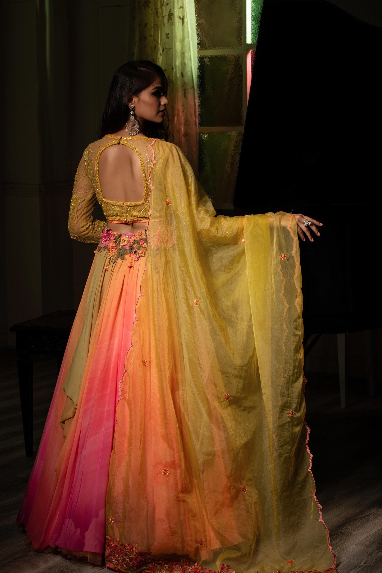 Yellow pink lehenga with quarter sleeved blouse and dupatta