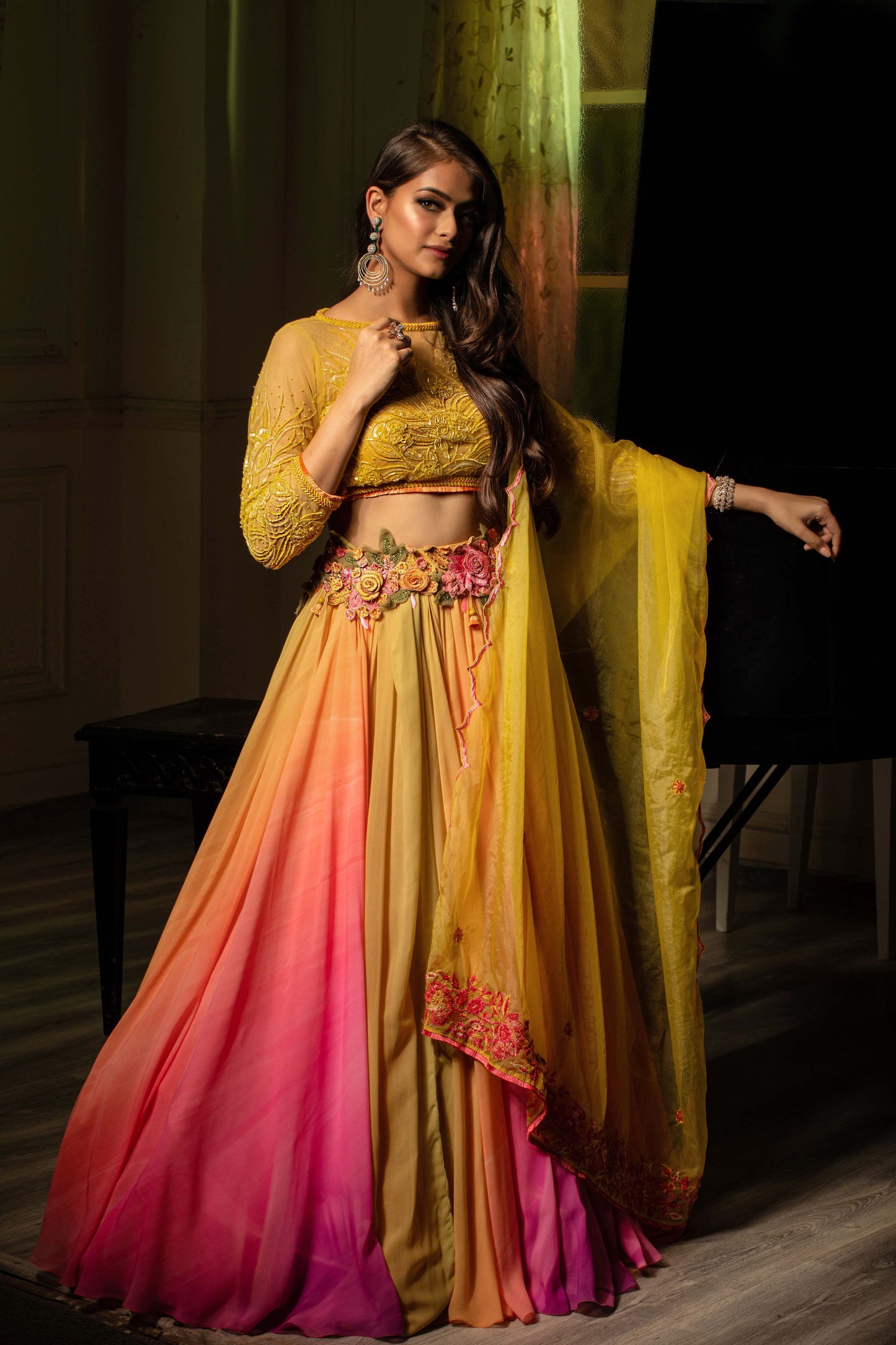 Yellow pink lehenga with quarter sleeved blouse and dupatta