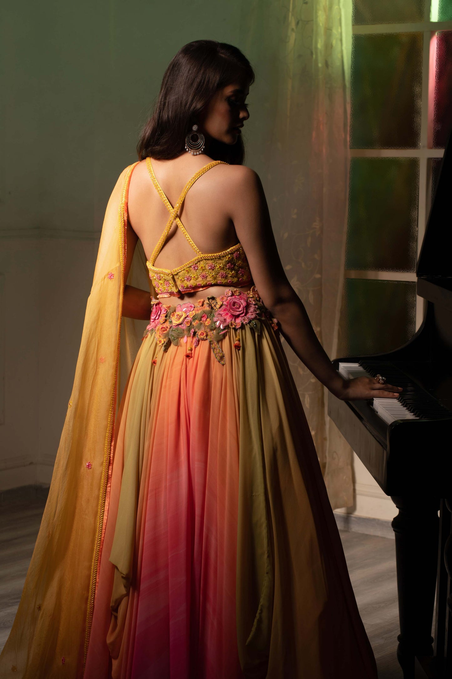 Yellow pink LEHENGA with halter blouse and cape